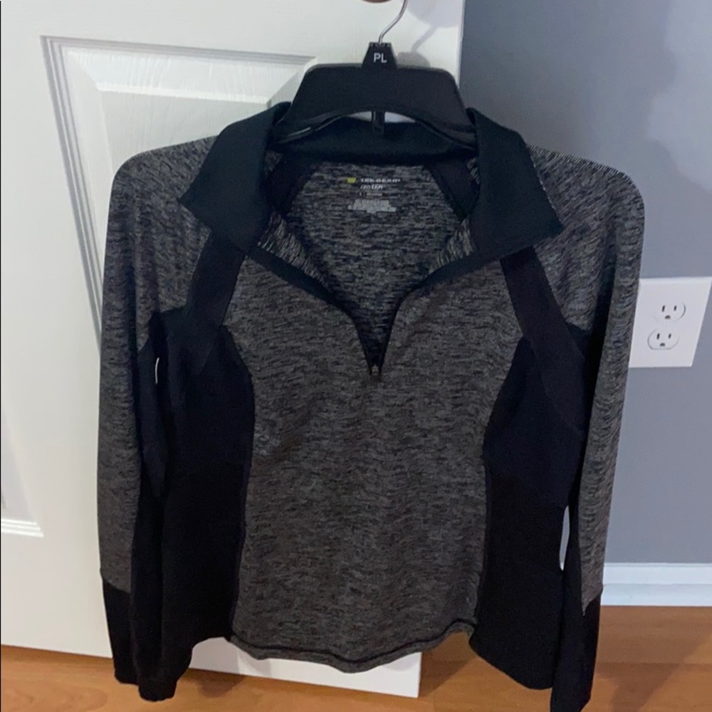 Woman’s half zipper work out shirt